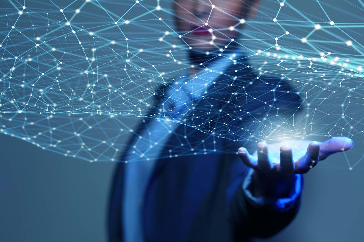 Man with digital network hologram
