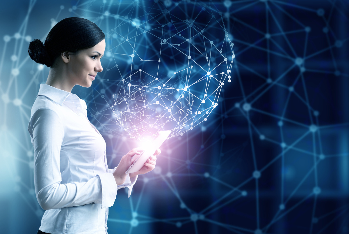 Smiling woman working on tablet